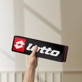 Unlit Lotto LED lightbox held by hand to show size and details