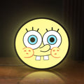 Front view of Sponge Bob LED lightbox sign glowing on a wooden desk