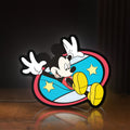 Front view of Mickey Mouse LED lightbox sign glowing on a wooden desk