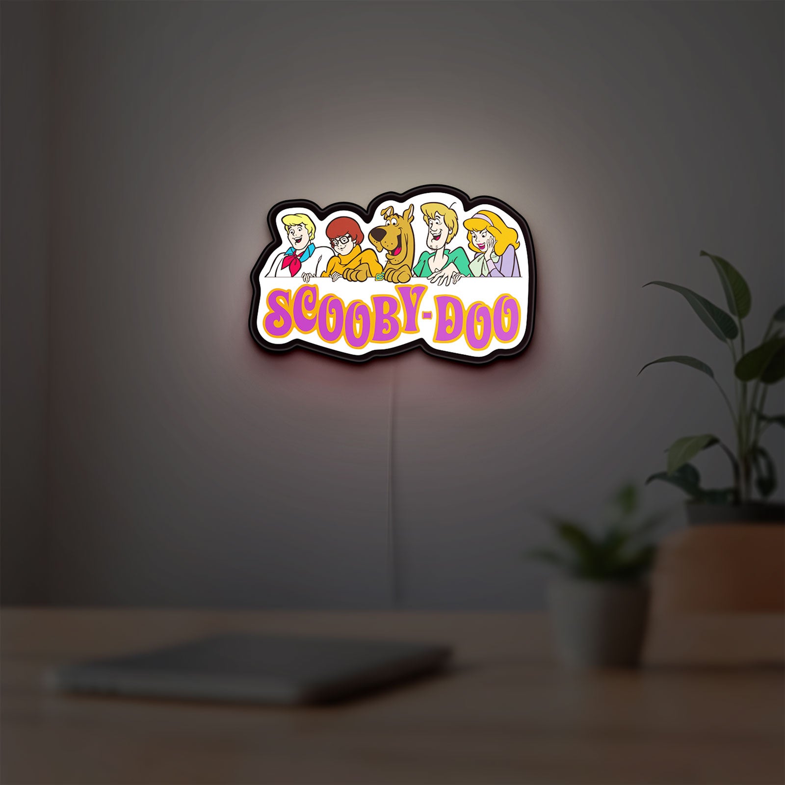 Scooby Doo LED lightbox hanging on a room wall with soft white light