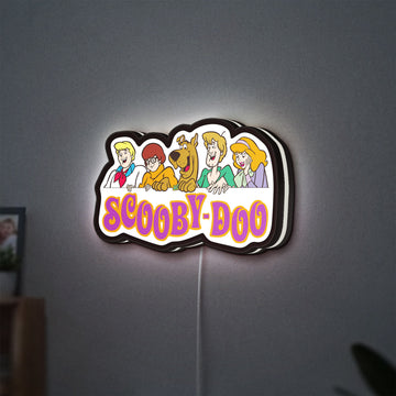 Scooby Doo LED lightbox hanging on a wall with white glow