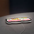 Scooby Doo LED lightbox lying flat on a desk with white glow