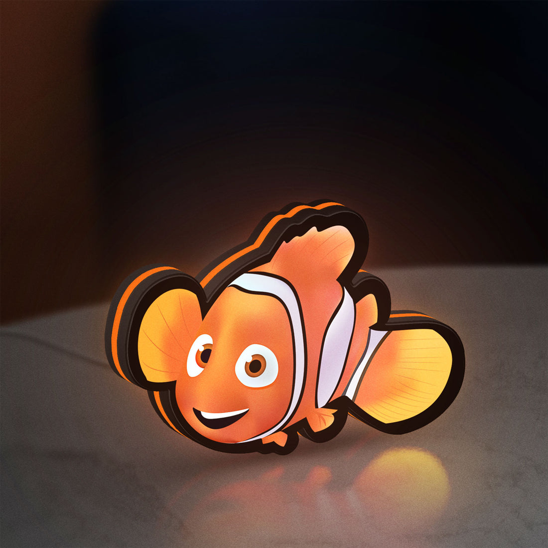 Sharan Rudrox Nemo Mesh LED lightbox hanging on a wall with orange glow
