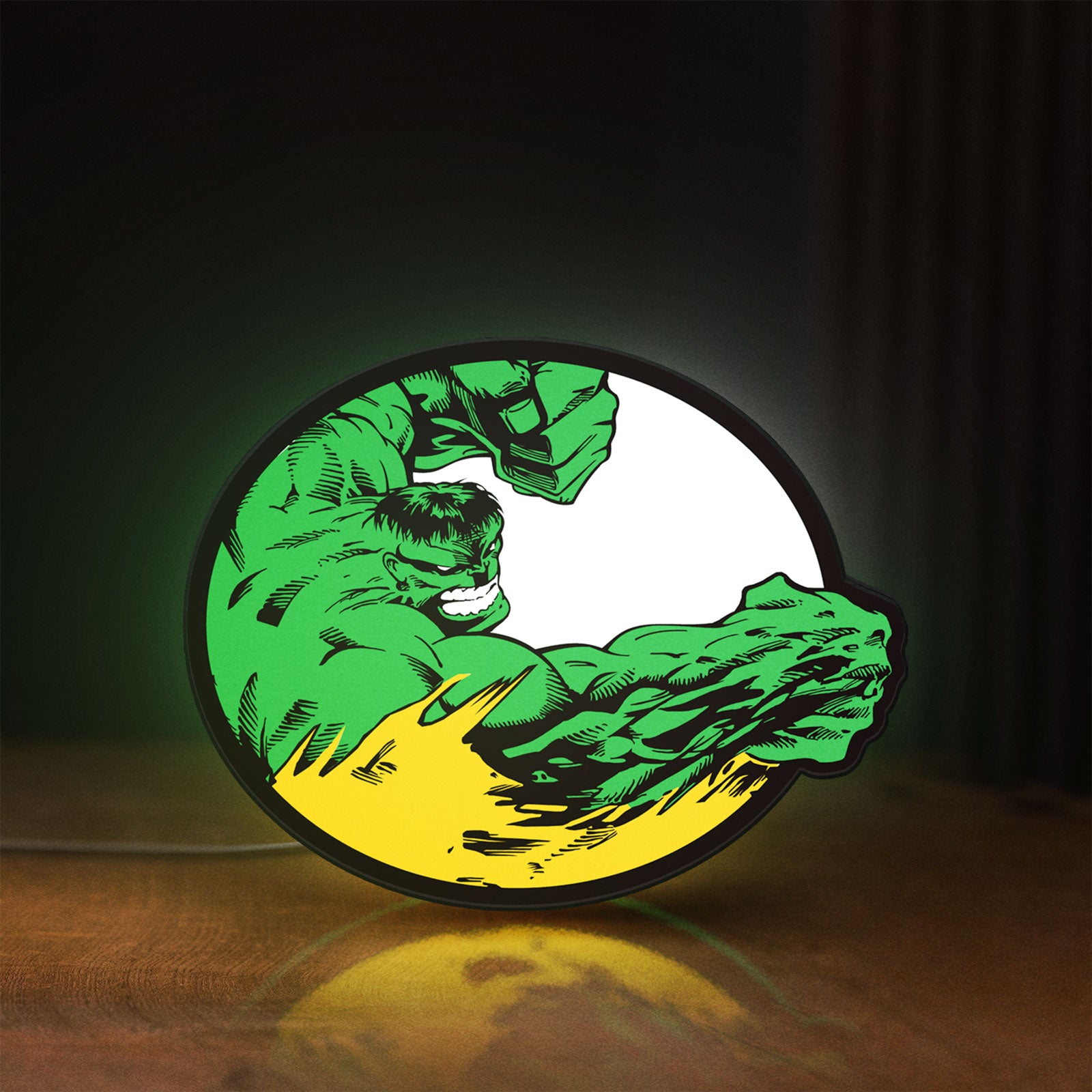 Front view of Hulk LED lightbox sign glowing on a wooden desk
