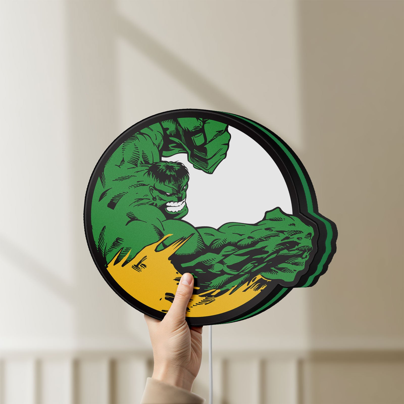 Unlit Hulk LED lightbox held by hand to show size and details
