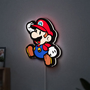 Super Mario LED lightbox hanging on a wall with white glow