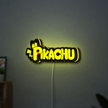 Pikachu LED lightbox hanging on a wall with yellow glow