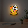 Mickey Mouse Inspired LED lightbox hanging on a room wall with soft yellow light