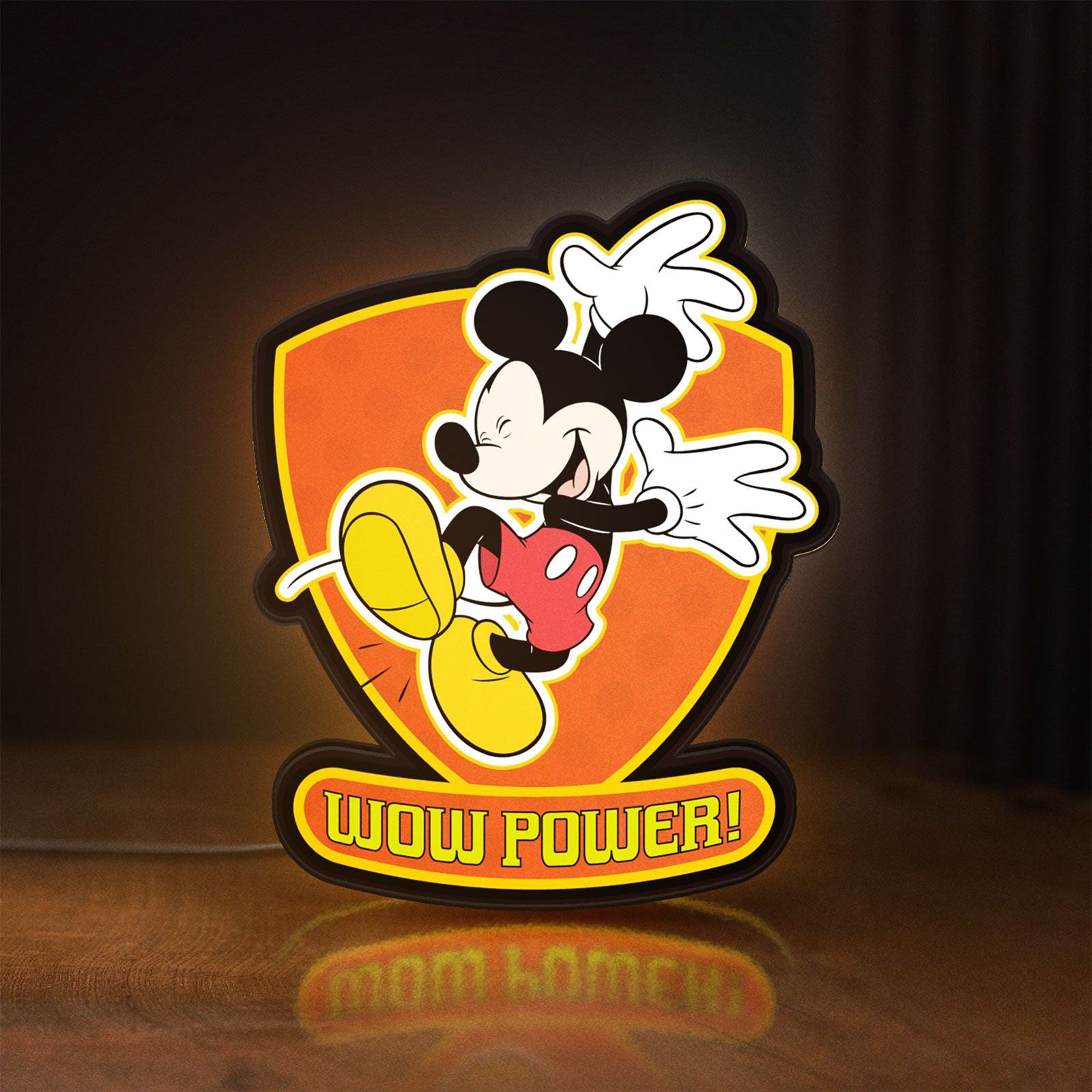 Front view of Mickey Mouse Inspired LED lightbox sign glowing on a wooden desk