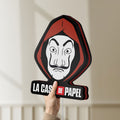 Unlit La Casa De Papel LED lightbox held by hand to show size and details