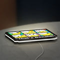 That's Donald LED lightbox lying flat on a desk with white glow