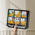 Unlit That's Donald LED lightbox held by hand to show size and details