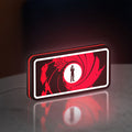 James Bond 007 LED lightbox standing on a desk from an angled side view with red glow