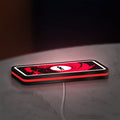 James Bond 007 LED lightbox lying flat on a desk with red glow