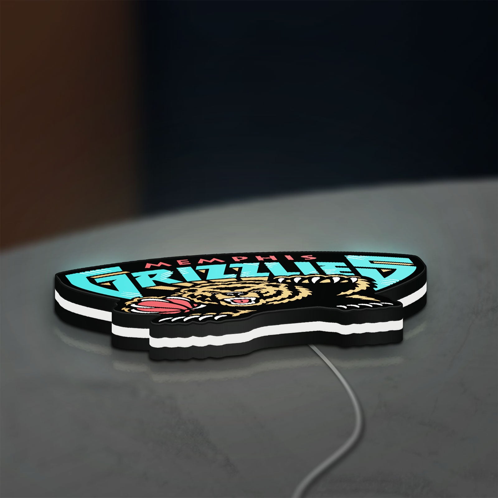 Memphis Grizzlies LED lightbox lying flat on a desk with white glow