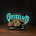 Front view of Memphis Grizzlies LED lightbox sign glowing on a wooden desk