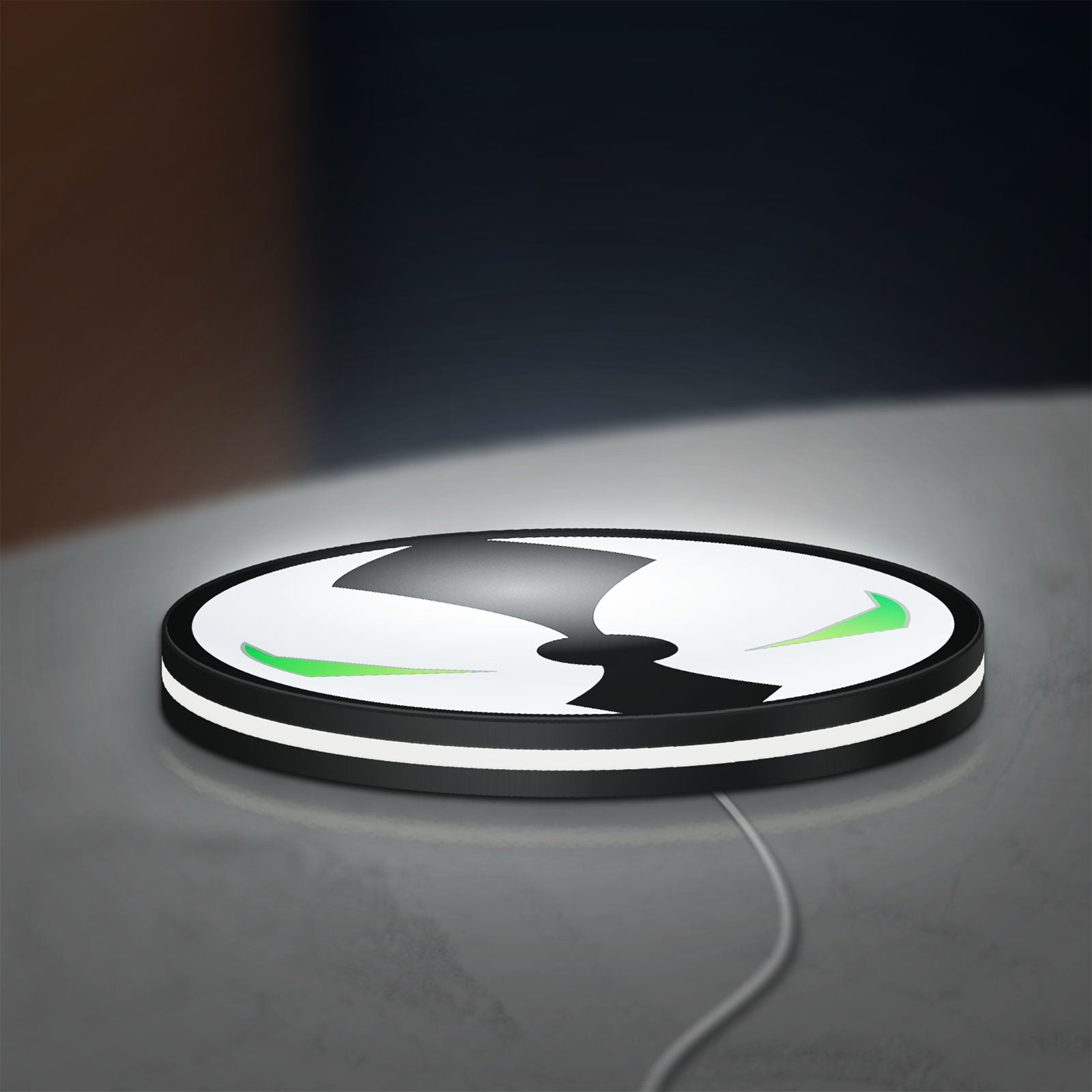 Spawn Mask LED lightbox lying flat on a desk with white glow