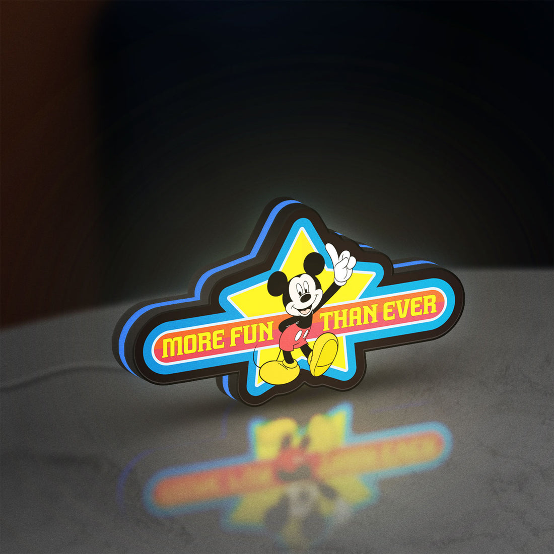 Mickey Mouse LED lightbox hanging on a wall with blue glow