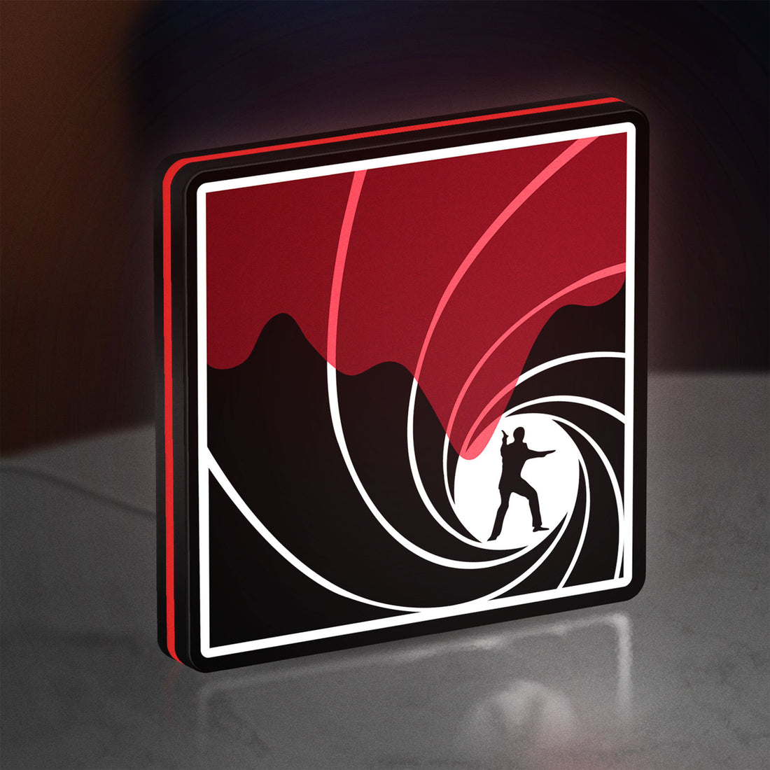 James Bond 007 LED lightbox hanging on a wall with red glow