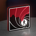 James Bond 007 LED lightbox standing on a desk from an angled side view with red glow