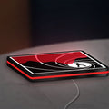 James Bond 007 LED lightbox lying flat on a desk with red glow