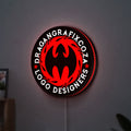Custom LED Logo Sign LED lightbox hanging on a wall with red glow