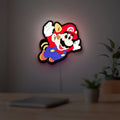 Super Mario LED lightbox hanging on a room wall with soft white light