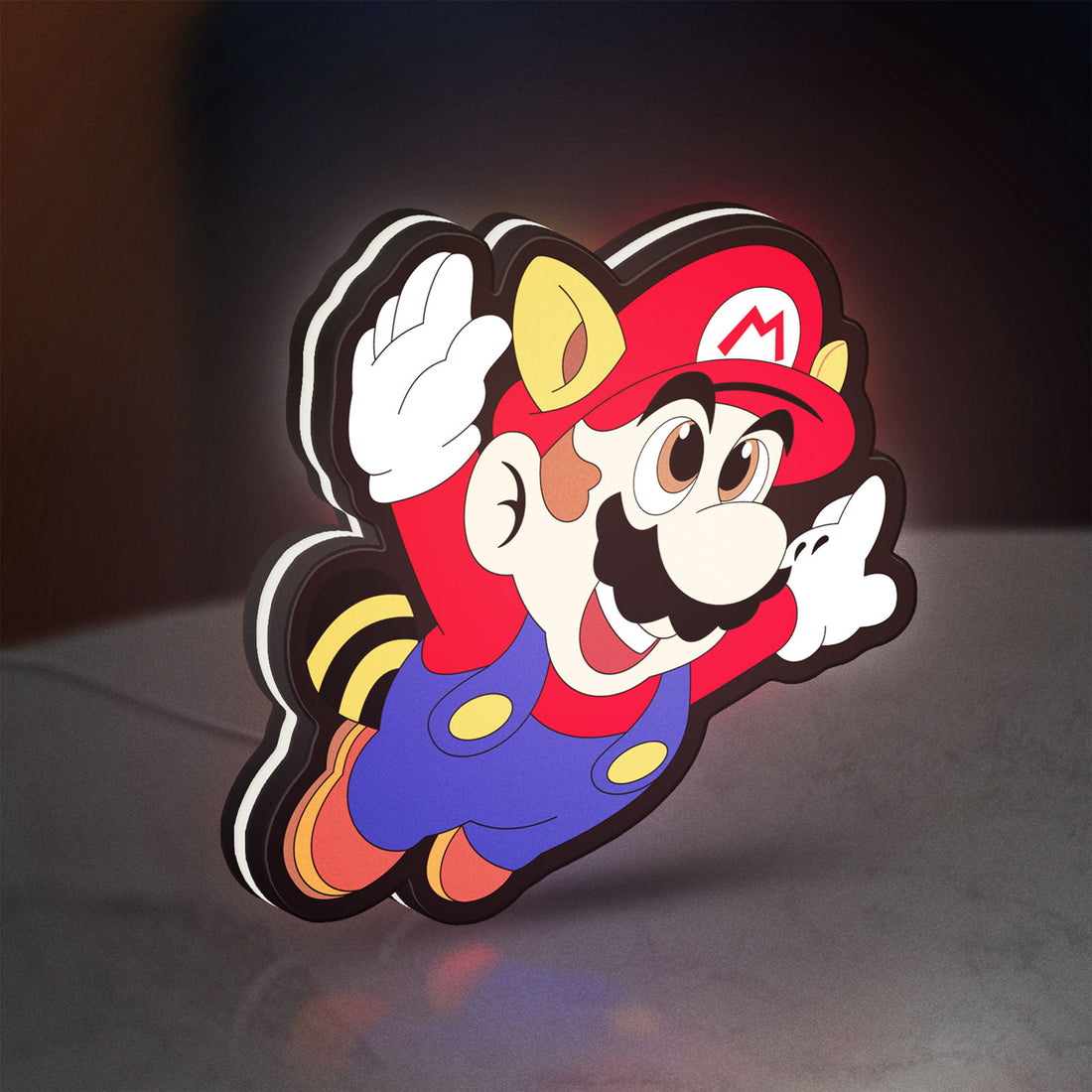 Super Mario LED lightbox hanging on a wall with white glow