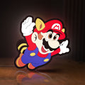 Front view of Super Mario LED lightbox sign glowing on a wooden desk