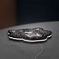 KENZO PARIS LED lightbox lying flat on a desk with white glow