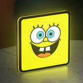 Spongebob Squarepants LED lightbox standing on a desk from an angled side view with yellow glow