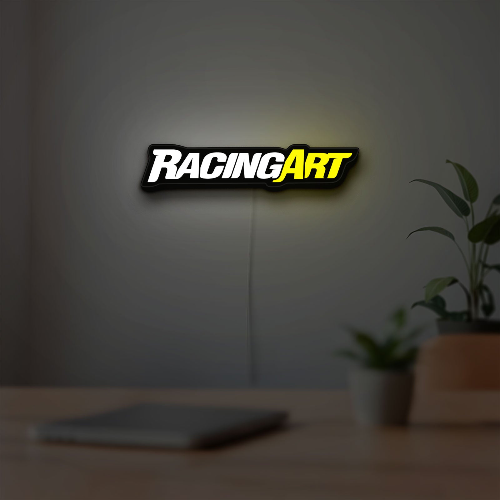 Racing Art LED lightbox hanging on a room wall with soft yellow light