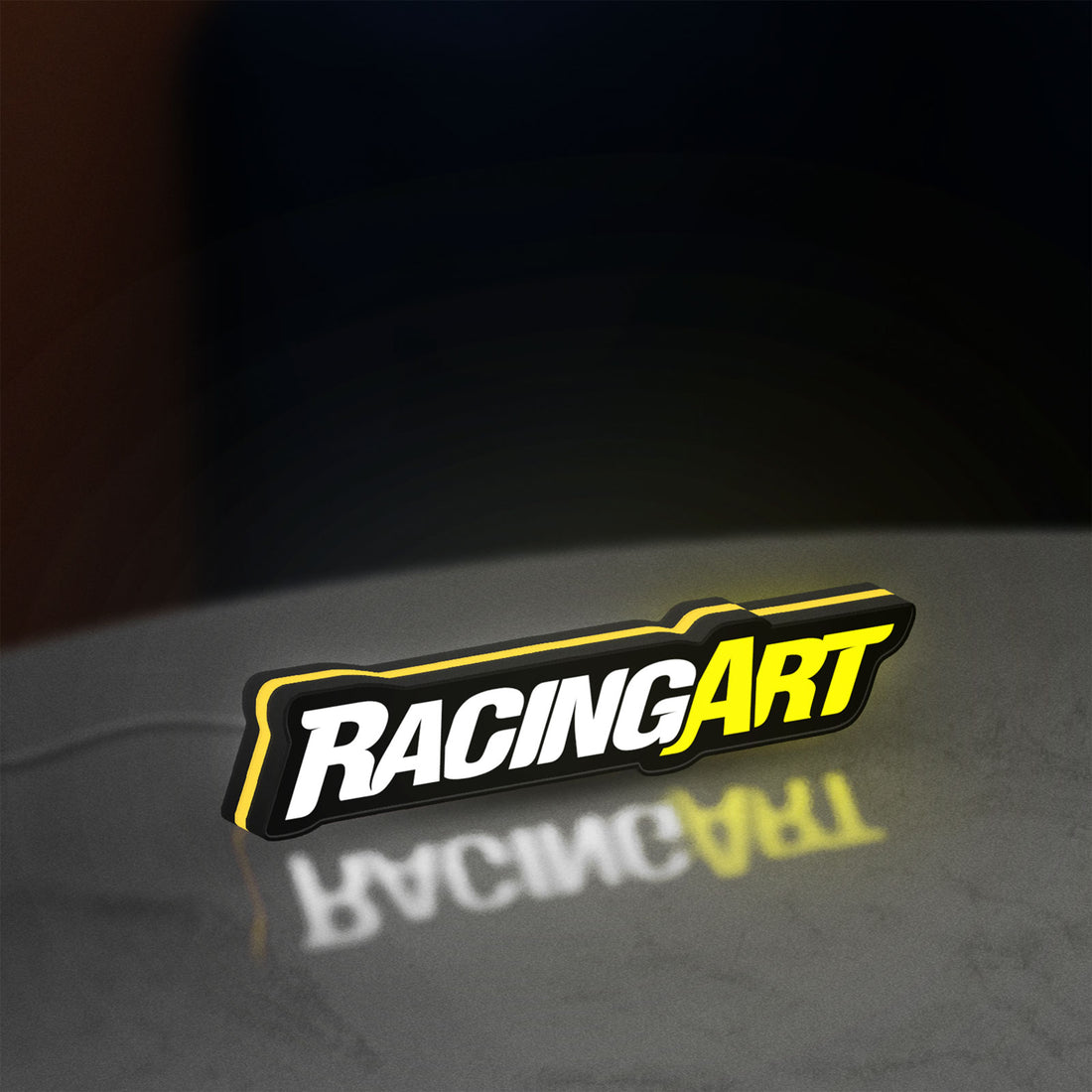 Racing Art LED lightbox hanging on a wall with yellow glow