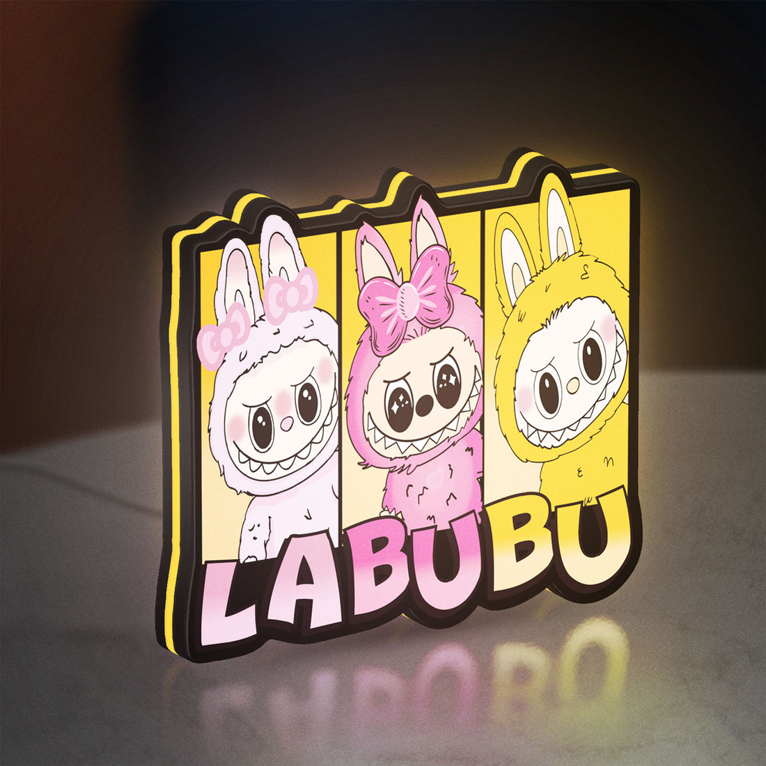 Labubu LED lightbox hanging on a wall with yellow glow