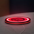 Apache Indian LED lightbox lying flat on a desk with red glow
