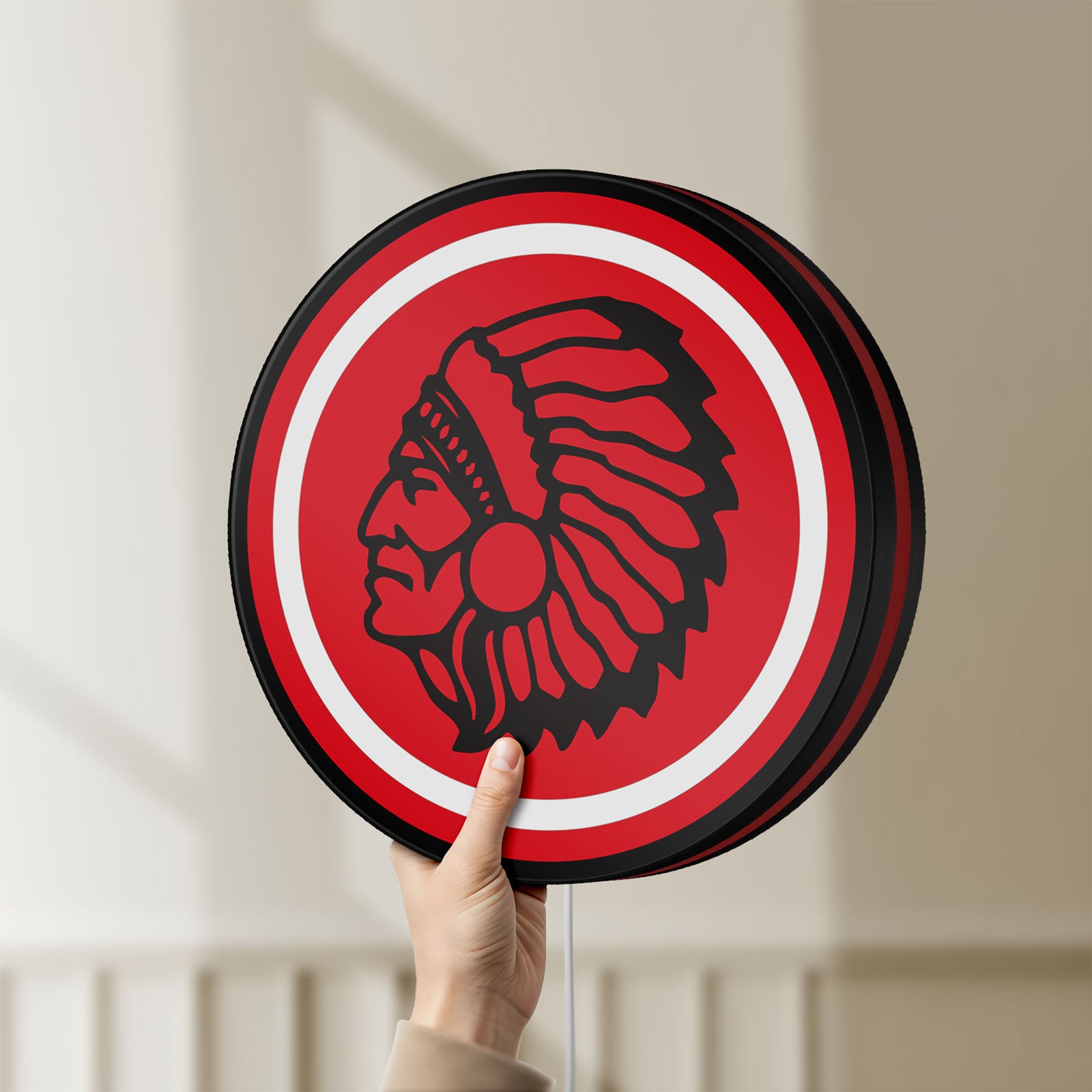 Unlit Apache Indian LED lightbox held by hand to show size and details