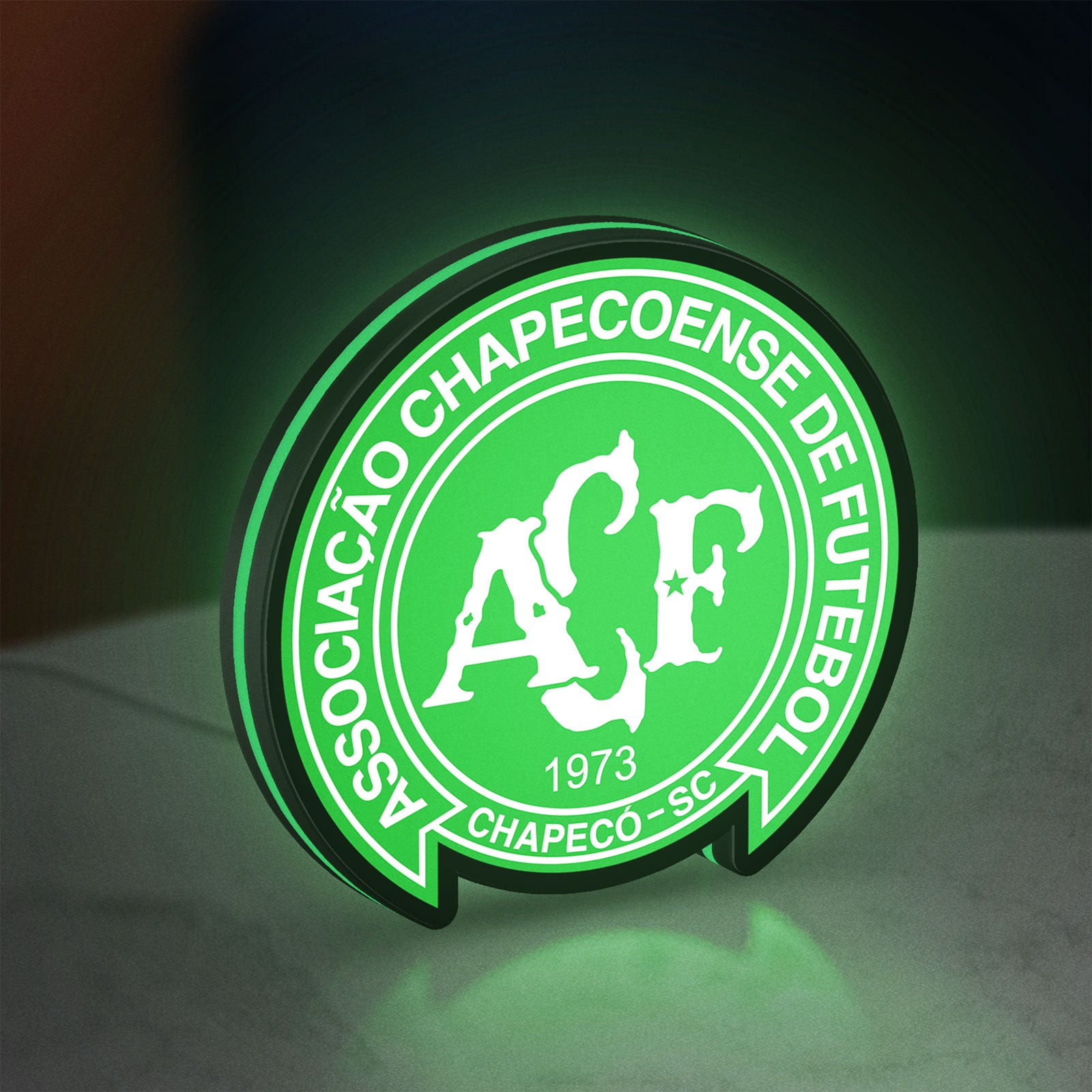 Chapecoense 2017 LED lightbox standing on a desk from an angled side view with green glow