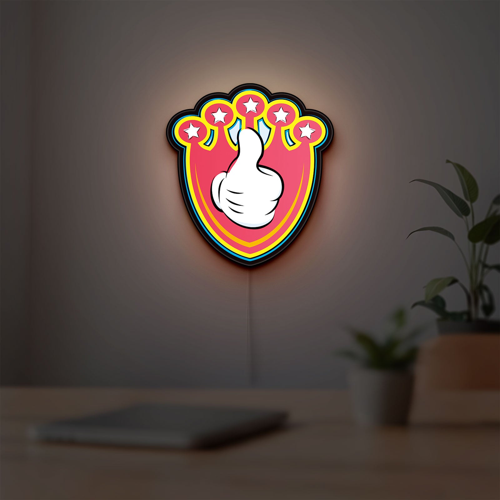 Mickey Mouse LED lightbox hanging on a room wall with soft yellow light