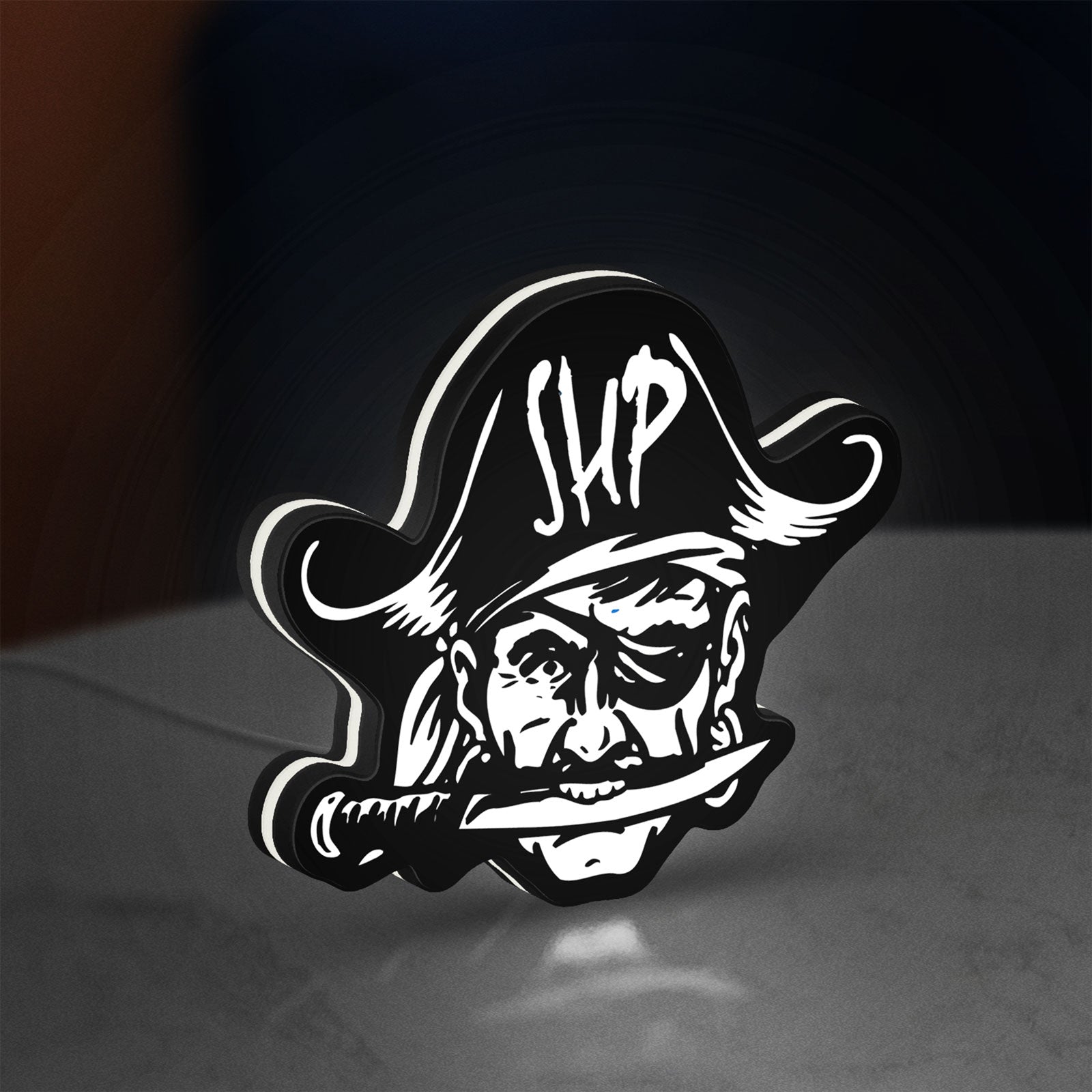 Straw Hat Pirates LED lightbox standing on a desk from an angled side view with white glow