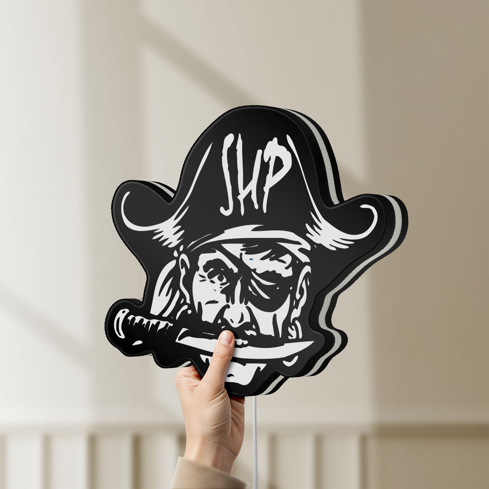 Unlit Straw Hat Pirates LED lightbox held by hand to show size and details