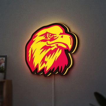 Eagle Head LED lightbox hanging on a wall with yellow glow