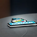 Donald LED lightbox lying flat on a desk with white glow