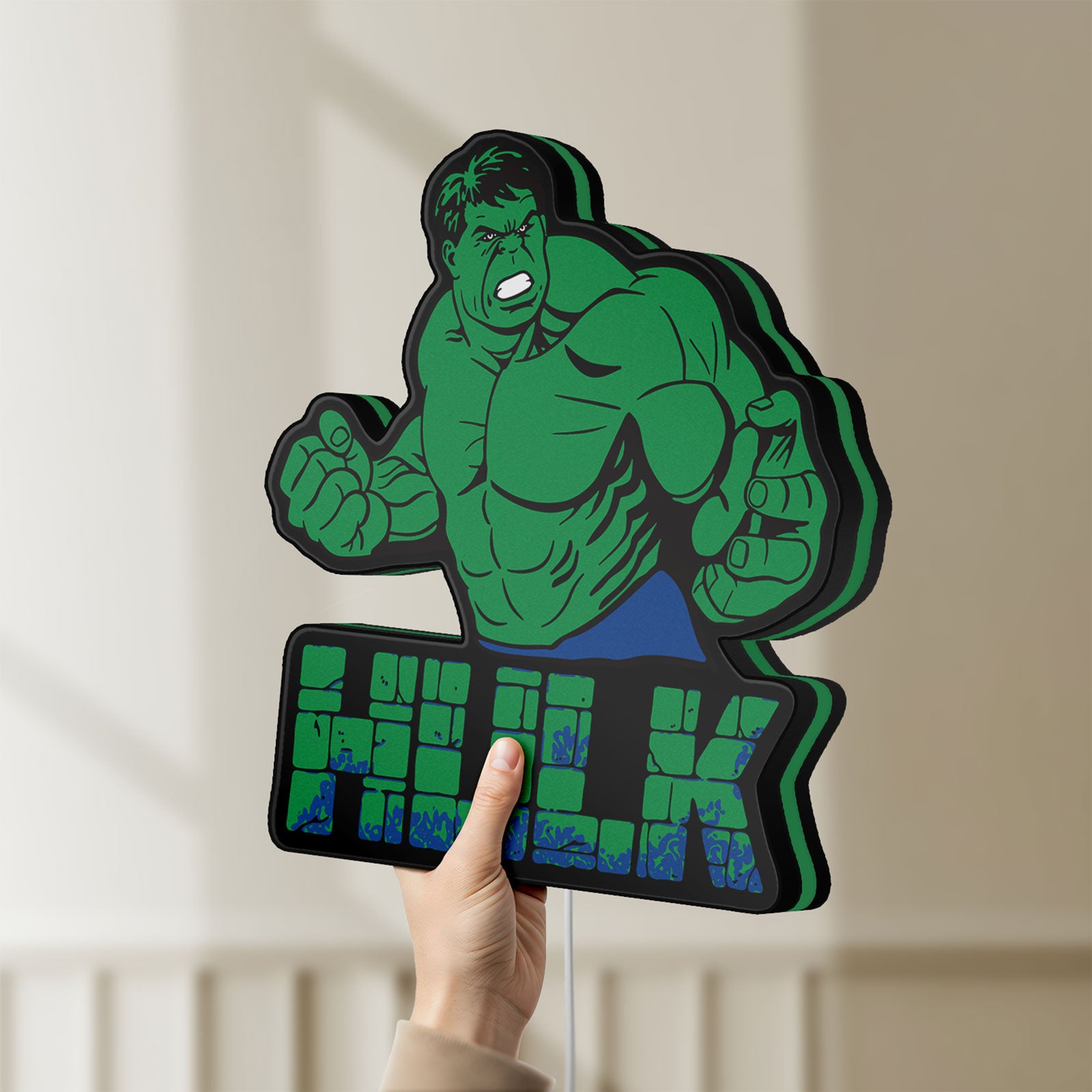 Unlit Hulk LED lightbox held by hand to show size and details