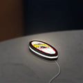 Mormai Surf LED lightbox lying flat on a desk with white glow