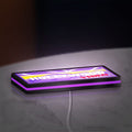 Hollywood Video LED lightbox lying flat on a desk with purple glow