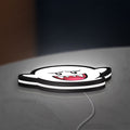Boo LED lightbox lying flat on a desk with white glow