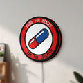 Unlit Akira Patch LED lightbox mounted on a wall in daylight