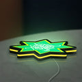 Selamat Idulfitri LED lightbox lying flat on a desk with yellow glow