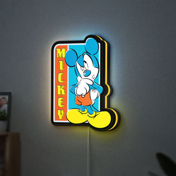 Mickey Mouse LED lightbox hanging on a wall with yellow glow