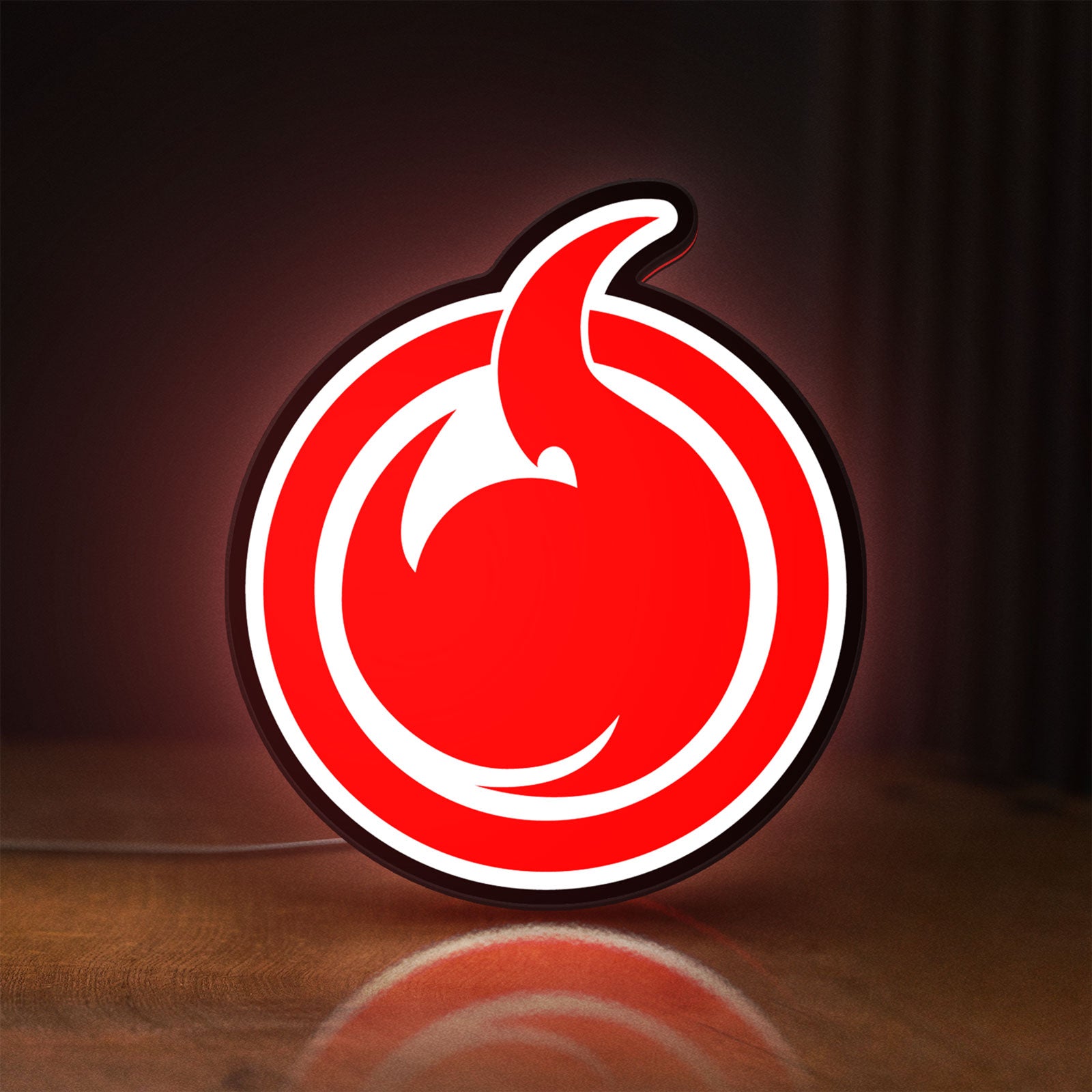 Front view of Hell Girl Fire Symbol LED lightbox sign glowing on a wooden desk